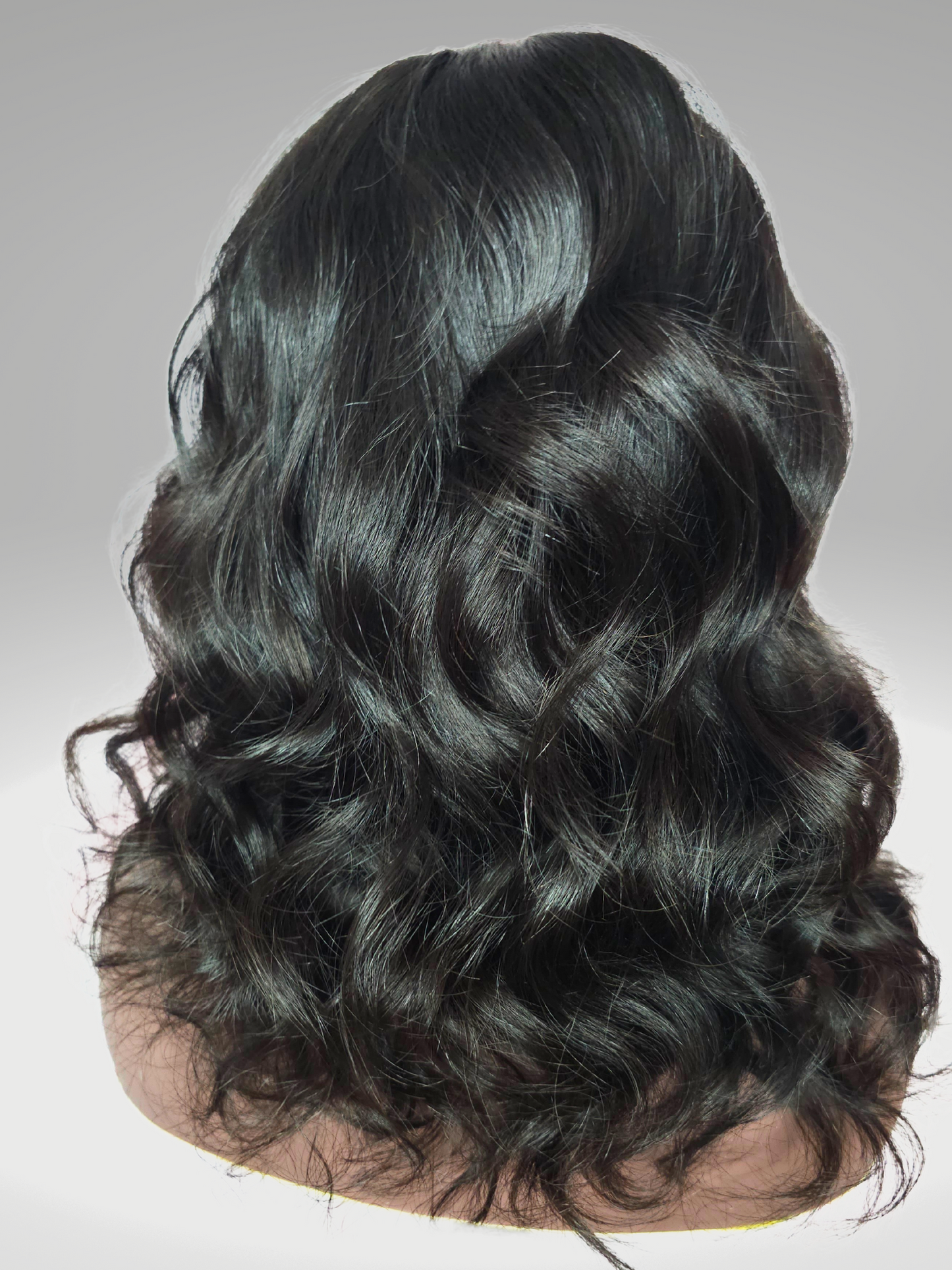 A stunning image of the Virgin Hair U-Part Divine Body Wave Wig, showcasing its luxurious body wave texture and natural sheen. The wig is displayed elegantly, highlighting the seamless U-Part design and the voluminous, bouncy waves that epitomize effortless glamour and versatility. Perfectly suited for those seeking a natural and sophisticated hair transformation.