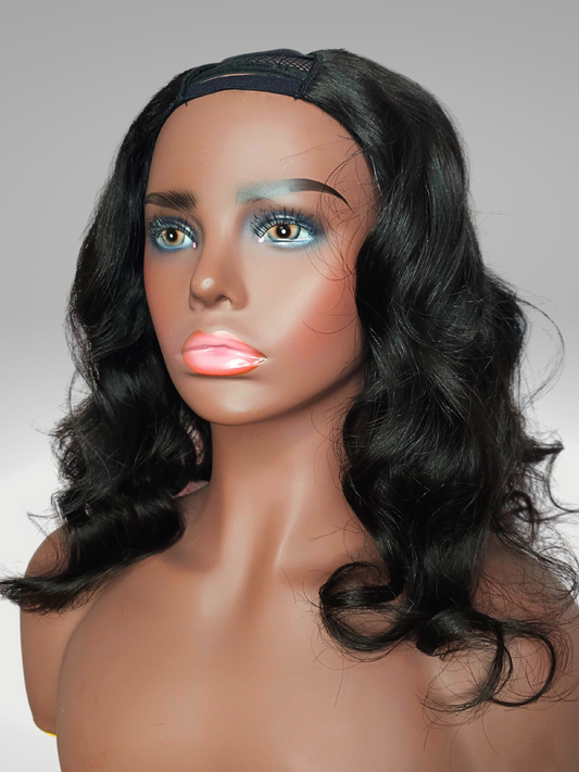 A stunning image of the Virgin Hair U-Part Divine Body Wave Wig, showcasing its luxurious body wave texture and natural sheen. The wig is displayed elegantly, highlighting the seamless U-Part design and the voluminous, bouncy waves that epitomize effortless glamour and versatility. Perfectly suited for those seeking a natural and sophisticated hair transformation.