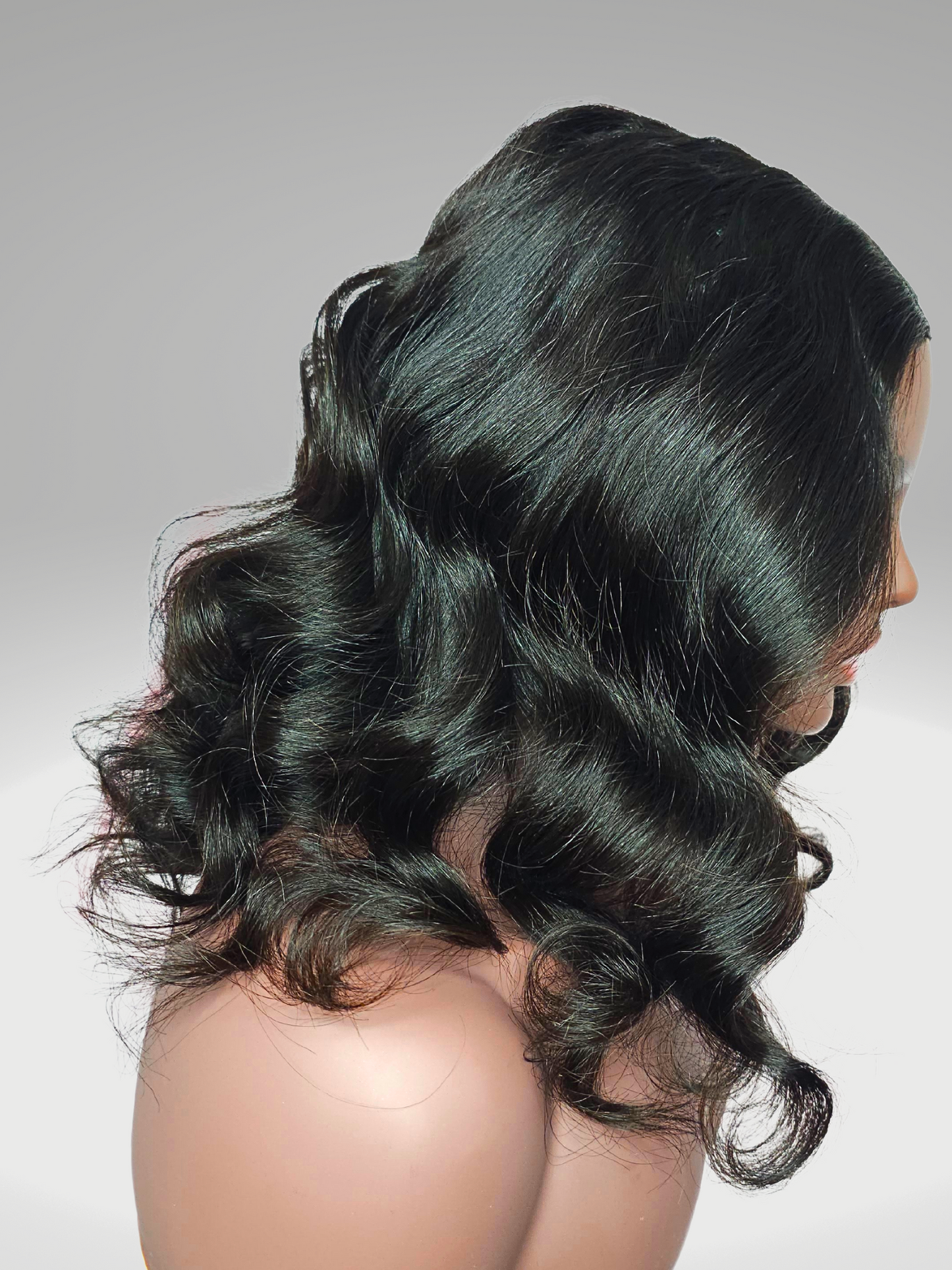 A stunning image of the Virgin Hair U-Part Divine Body Wave Wig, showcasing its luxurious body wave texture and natural sheen. The wig is displayed elegantly, highlighting the seamless U-Part design and the voluminous, bouncy waves that epitomize effortless glamour and versatility. Perfectly suited for those seeking a natural and sophisticated hair transformation.